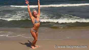 Still got it! Bikini-clad Livvy Dunne takes a break from Baywatch duties to flaunt gymnastics skills on the beach