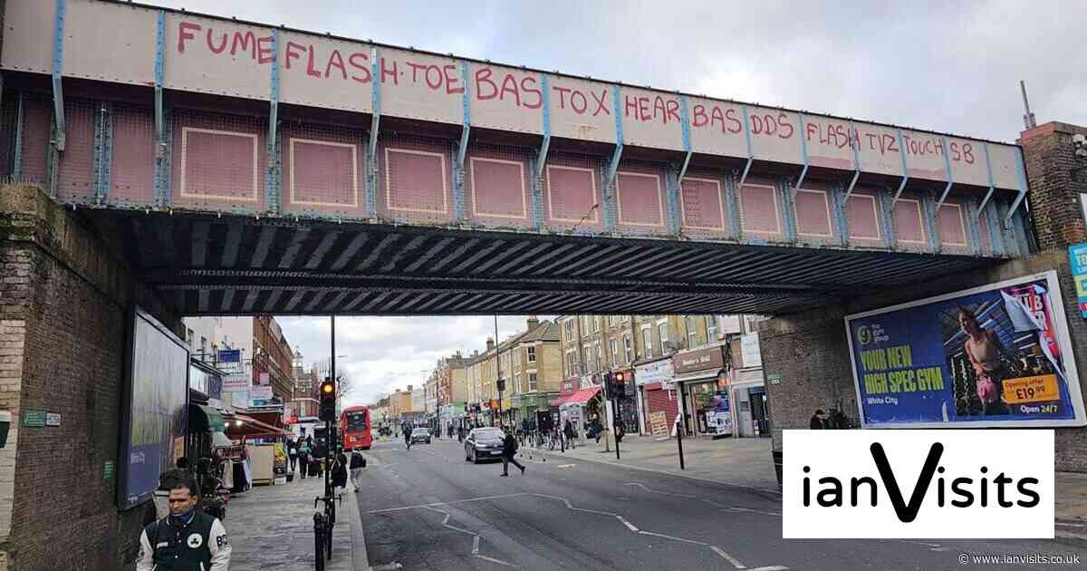 Council repaints Shepherd’s Bush rail bridge – and urges TfL to spruce up the station too