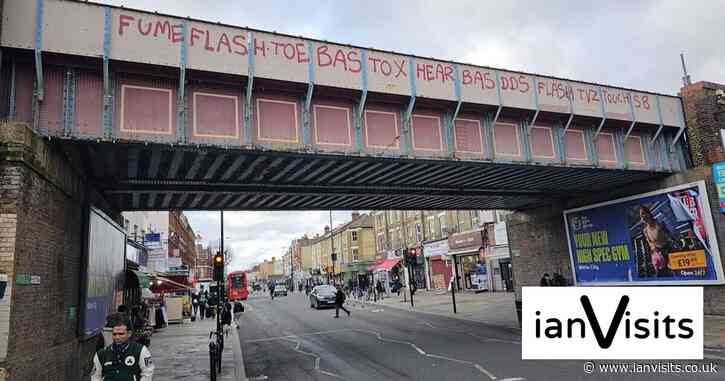 Council repaints Shepherd’s Bush rail bridge – and urges TfL to spruce up the station too