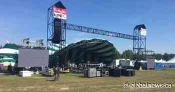 Edmonton’s summer of rain has Folk Fest trucking in sand, Fringe hiring meteorologist