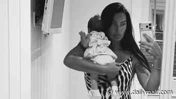 Annie Kilner shares first photo of her newborn daughter with Kyle Walker as she cuddles her in a sweet snap and says her arrival was 'worth the wait'