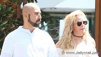 Does Britney Spears have a new boyfriend? Superstar steps out with a mystery man in Malibu while showing off her panties in sheer skirt