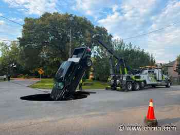 Massive sinkhole eats Texas pickup truck. Now comes the fight over money.