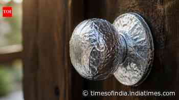 Aluminium foil doorknob hack: Wrap handles before painting; hardware stays scratch-free