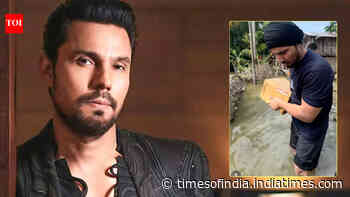 Randeep walks through Assam floodwaters to deliver essentials