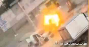 Video shows drone attacking a street vendor in Ukraine