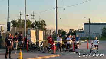 Be patient, Gordie Howe bridge authority says as pedestrians, cyclists wait to cross for the first time
