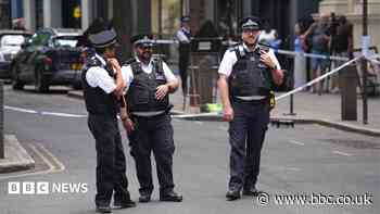 Woman arrested after four stabbed in central London