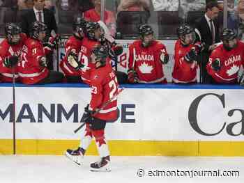 Schultz, Pue, linemates for the Regina Pats, lighting it up for Team Canada