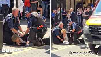 Woman arrested after four stabbed in central London