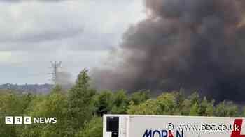 Fire crews tackle pallet fire at industrial site