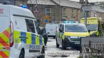 Armed police race to Lancashire street after man stabbed in neck
