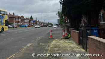 Two dead in horror crash on busy Manchester road after car ploughs into digger
