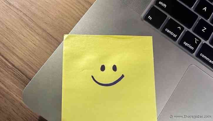 IT department put sticky notes on the laptops to help employees log in