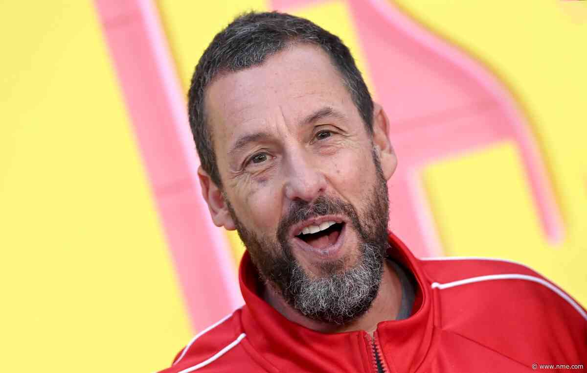 Adam Sandler wears socks when he goes swimming because “he can’t bend to take them off”