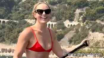 Lindsey Vonn shows off her shredded physique during paddleboard trip on vacation... six months after almost losing her leg in horror Olympics crash