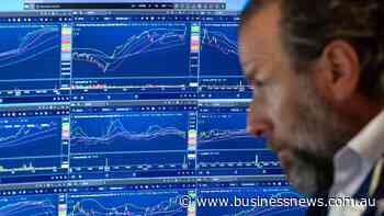 Wall St dips as investors monitor Iran talks, earnings