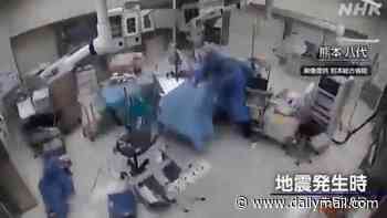 Moment Japanese surgeons cling to patient in operating theatre as 7.1 magnitude earthquake hits