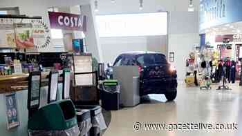 Watch as masked robbers ram-raid Wetherby Services on A1(M) in North Yorkshire