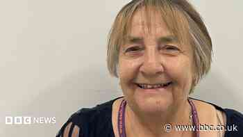 Grandmother volunteers at hospice shop to say thanks