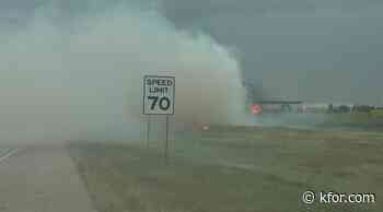 Grass fire impacting traffic on Kilpatrick Turnpike
