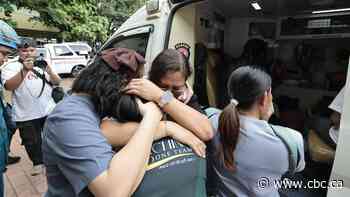 8 dead in Thailand as teen shoots grandparents, then people at school