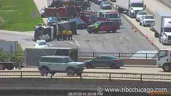 Delays on I-55 in west suburbs after rolled-over dump truck spills gravel across lanes
