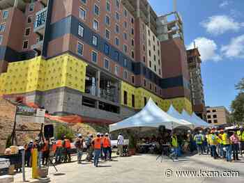 Texas State University celebrates topping out of new residence halls
