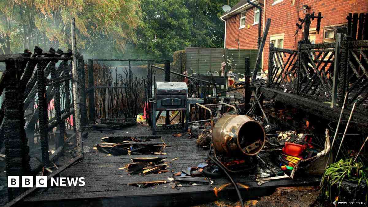 'Deliberate' field fire damages houses and gardens