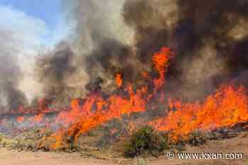 A helicopter battling a Utah wildfire crashes, with no word on the 2 aboard