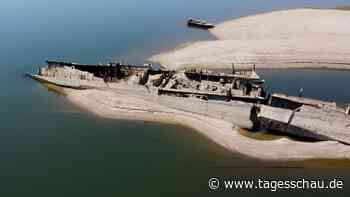 Niedrigwasser der Donau legt Knochen und Wracks frei