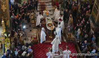 Ukraine honors its 'collector of souls' killed while recovering the war dead