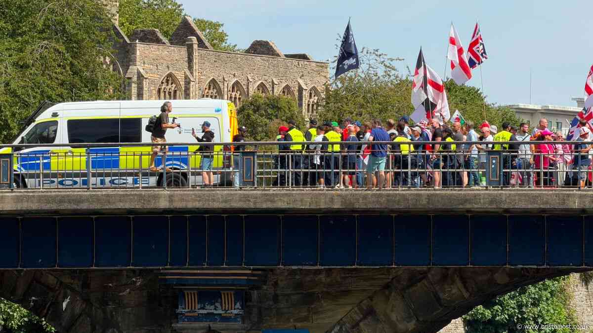 Bristol protest arrests as police form barrier between rival groups - live updates