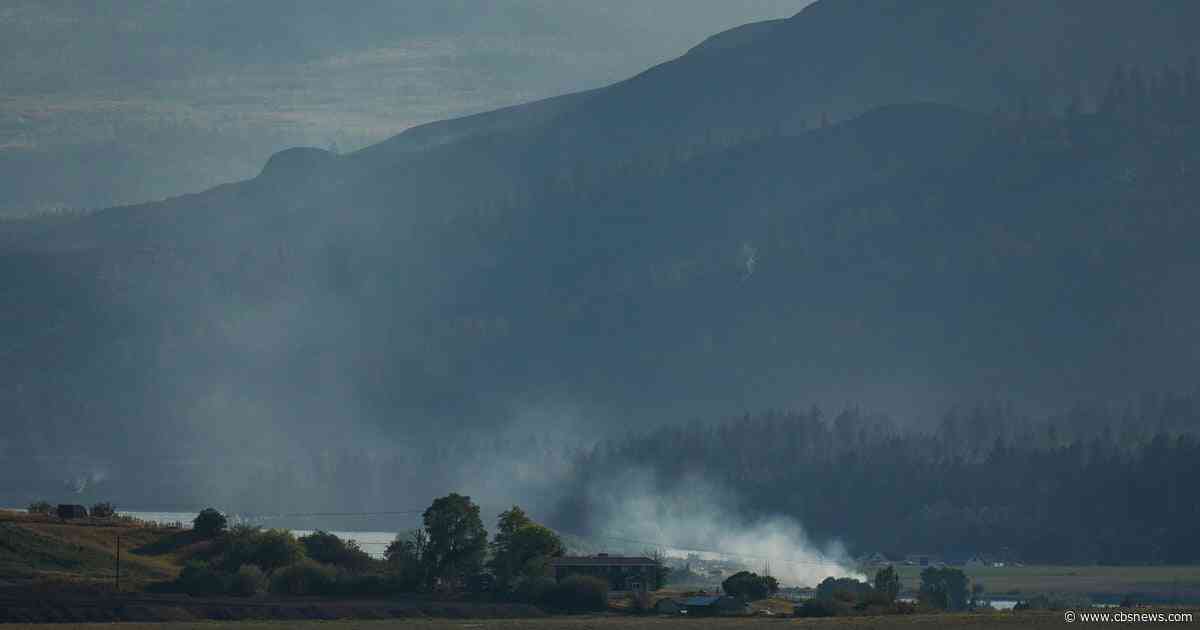 Wildfires in western Canada forces more than 20,000 people to evacuate