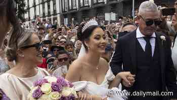 Ronald-NO! Thousands of CR7 fans mob bemused wedding couple wrongly believing they are the famous footballer and his fiancee Georgina Rodriguez
