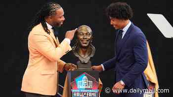 Welcome to Canton! Emotional moment NFL legend Larry Fitzgerald is inducted into the Pro Football Hall of Fame by his Notre Dame star son