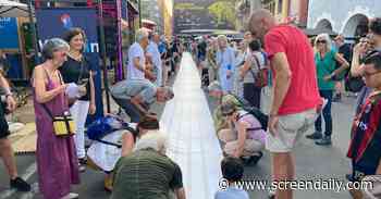 Locarno film festival protest sees huge shroud unfurled with names of 60,000 killed in Gaza