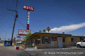 Woman stabbed at Las Vegas motel sues property, escort website
