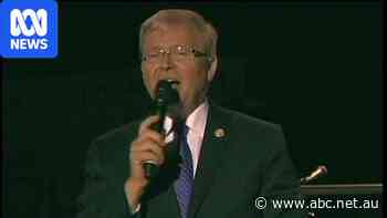 Kevin Rudd takes to the stage at a charity event.