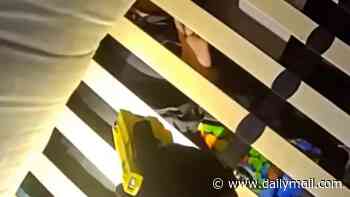 Moment stalker is found hiding under the bed by armed police after hitting three people while speeding