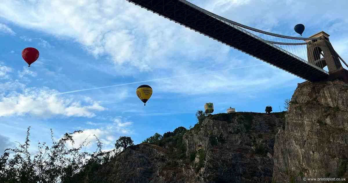 In pictures: Hot air balloons drift over Clifton Suspension Bridge in stunning fiesta display