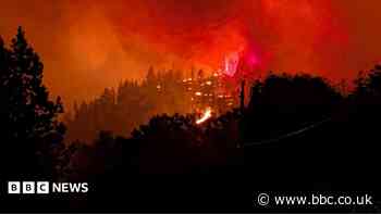Fast-moving Canada wildfire doubles in size forcing thousands to flee homes