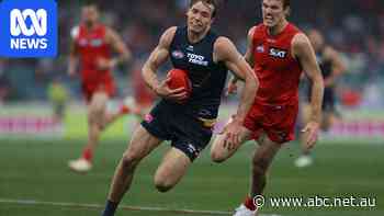 Live: Giants defender cops rib injury in wet-weather slugfest against Suns