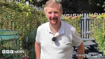 Volunteer turns yard into prize-winning garden