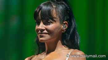 Lily Allen headlines Boardmasters Festival in a satin corset and lace underwear as she brings her her West End Girl show to Cornwall