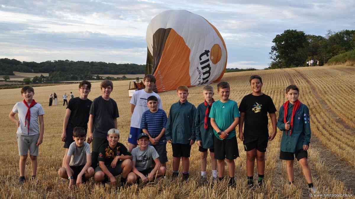 Scouts on camping trip help land Fiesta balloon