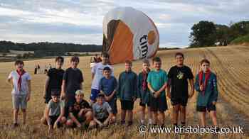 Scouts on camping trip help land Fiesta balloon