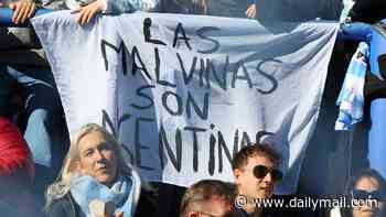 Argentina rugby fans display 'Malvinas' banner laying claim to the Falkland Islands - as bad blood lingers after World Cup semi-final