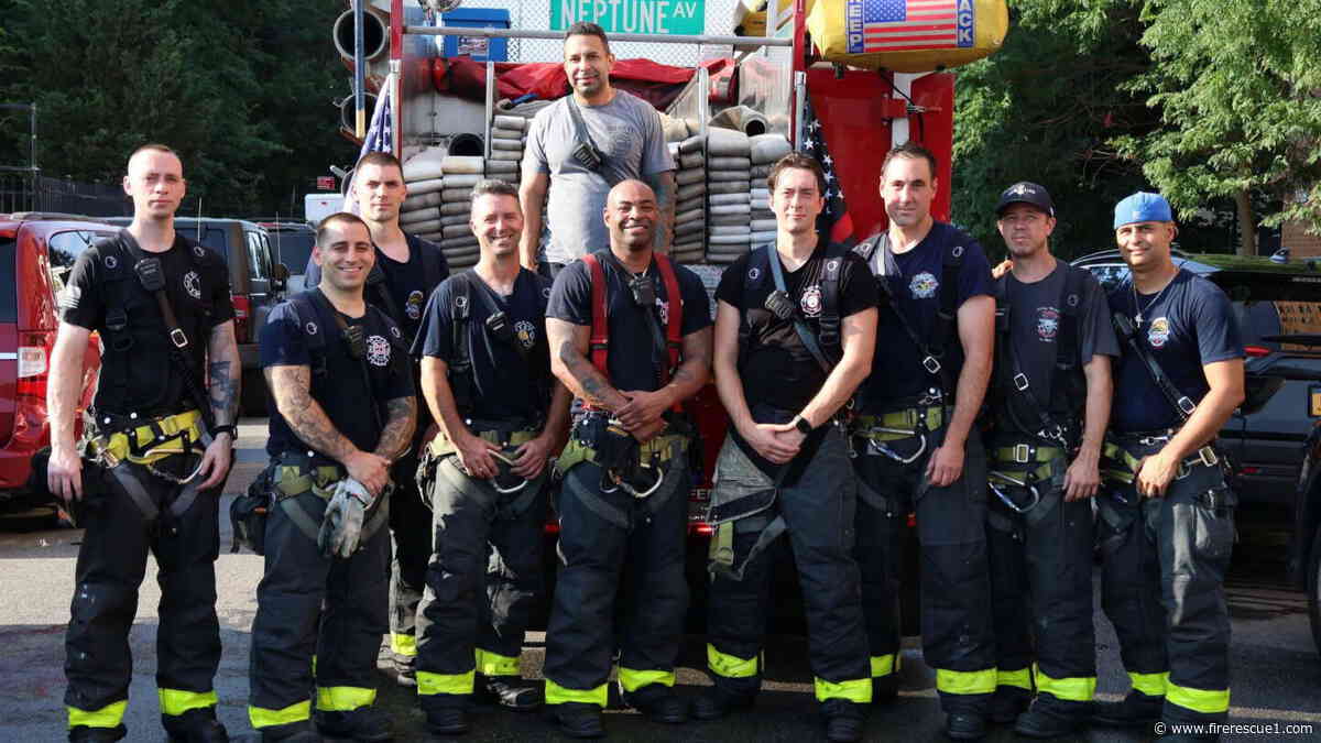 FDNY probie carries resident to safety from cluttered apartment fire