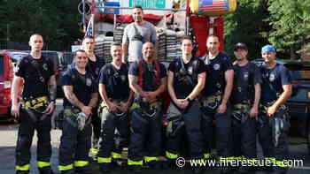 FDNY probie carries resident to safety from cluttered apartment fire